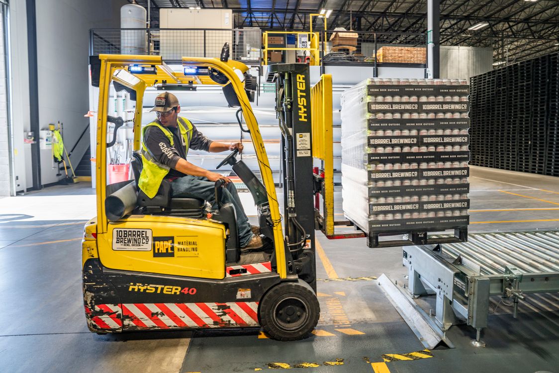 Modern warehouse interior highlighting the need for efficient freight and cargo elevator solutions in Dubai